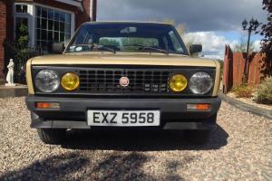  fiat 131 twin cam with sport / racing grille and arches.  Photo