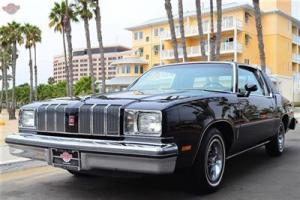 78 Cutlass Supreme with 4702 miles from new!  Black/Black, spectacular example Photo