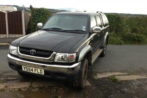  TOYOTA HILUX INVINCIBLE, BLACK, VERY LOW MILAGE ONLY 75K MILES WARRENTED. 