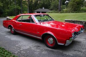 1967 OLDS 442 SURVIVOR CAR,FACTORY RED CAR ,BLACK BUCKETS,78,000mi,NO RESERVE Photo