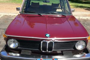 1975 2002  Burgundy BMW  with tan interior.