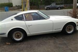 1973 Datsun 240 Z  color white. 2 door coup red interior Photo
