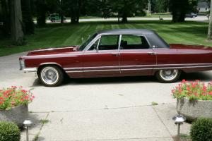 1968 Imperial, LeBaron. Burgundy with black leather interior and top. Loaded!