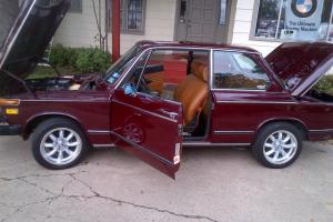 1976  BMW 2002 Malaga Red, new bucksin leather interior, all new