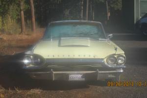 2 1964 thunderbird  project cars. one car will  drive and the motor runs well Photo