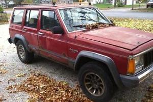 for sale red 1988 jeep cherokee larado 4.0l straight 6 4X4 4dr Photo
