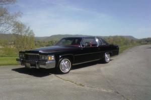 1977 Cadillac Coupe de Ville.  Black.  16,711 actual miles.  Excellent condition