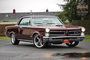 1965, 389, 5 speed, posi, new wheels, nice paint and interior, great GTO! Photo