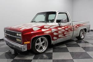 AWESOME CUSTOM PAINT JOB, 20 INCH WHEELS, 350 V8, CLEAN GMC TRUCK, PRICED RIGHT Photo