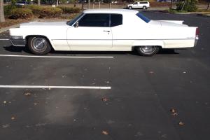 1969 Cadillac Coupe Deville Lowered with FlowMasters. Tinted windows Photo