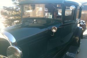 Rebuilt 1929 Fordor Model A, dark green, rebuilt engine, restored interior Photo