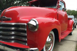 1953 Red 3100 Chevy 5 Window Pickup with a V8 Photo