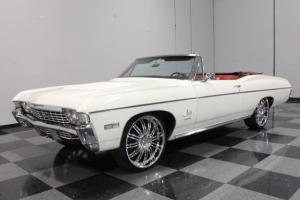 396 CI, RESTORED IN CORRECT ERMIE WHITE ON RED, POWER TOP, A/C, PS, PB, 22