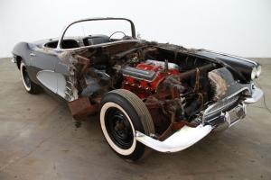 1961 Chevrolet Corvette, black with silver coves, comes with many extra parts