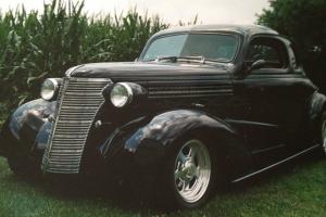 Black all steel body 38 chevy coupe Street Rod