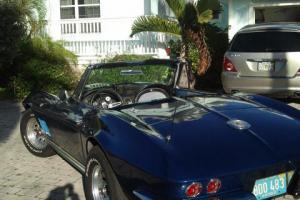 1964 Chevy Corvette Roadster, dark blue/blue leather.