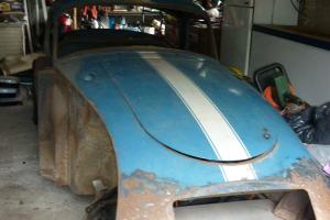 For sale is a left hand drive 1958mga coupe for full restoration or spares Photo