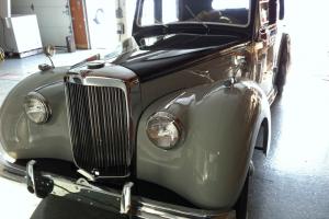1952 Alvis TA-21: black and grey  four door with wood-grain dash