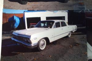 1963 Chevrolet Impala 4 dr white excellent condition, new paint job Photo