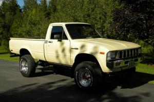 Totally Restored, 4X4 long bed toyota truck, manual transmission Photo