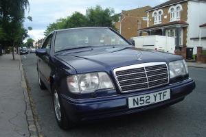 Mercede E320 Coupe. Metallic blue with beige leather. Photo