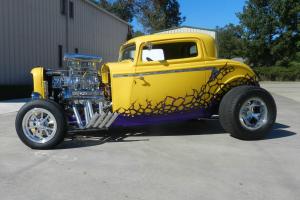 1932 yellow ford  3 window coupe Photo