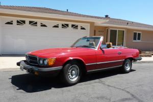red with tan interior, both tops, excellent condition! Photo