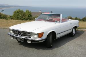 Mercedes 350sl 1973 classic white with red interior Photo