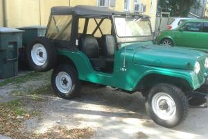 1961 Willy's Jeep CJ5 Metalic Green Soft top 50,420 miles