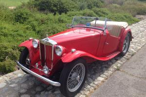 1949 MG TC Red/tan. 4-speed. Wire Wheels. RHD. Excellent driver. Older resto. Photo