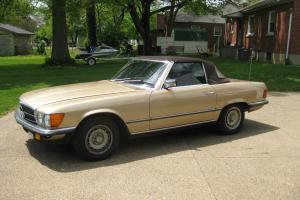 1982 Gold 2-Door 280 SL with six cylinder five speed manual trans. - very rare