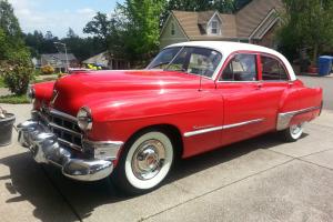 1949 Red and White Cadillac Series 62 4 Doors