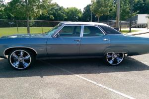 chevy classic,impala,belair,blue,four door,chevrolet,old cars,1969 chevrolet. Photo