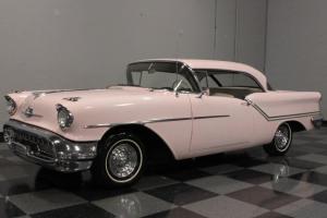 50'S SUNSET GLOW, BETTER KNOWN AS MARY KAY PINK, ROCKET 371 V8, HYDRA-MATIC!!! Photo