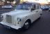 London Wedding Taxi. Roll Top Convertible. White, Fairway. Nissan Engine. Auto.