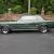 V8, auto trans, PS, buckets, console, stereo, solid, green, black