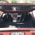 1975 Bricklin, red, daily driver.  Custom interior