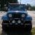 Jeep Scrambler CJ8 Sky Blue w/Rally top & family roll bar