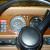 Blue, leather, wood grain dash and trim, built in bar