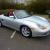 PORSCHE BOXSTER 1998 - SILVER WITH BLACK ROOF CONTRASTING RED HIDE INTERIOR