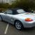 PORSCHE BOXSTER 1998 - SILVER WITH BLACK ROOF CONTRASTING RED HIDE INTERIOR