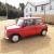 1995 Rover Mini Sprite in Flame Red and just 25,00 miles
