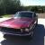 ford mustang fastback, deep maroon, automatic.