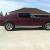 ford mustang fastback, deep maroon, automatic.