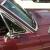 ford mustang fastback, deep maroon, automatic.