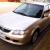 Mazda 323 Astina Shades 2003 5D Hatchback Manual 1 8L Multi Point F INJ in VIC