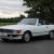 Mercedes-Benz R107 500 SL (1988) White with Mid Red Leather