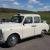 White Classic Carbodies Taxi M Reg / 1995