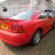 2000 Ford Mustang V6, 32,000mls automatic, leather, fantastic in red.
