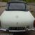 MGB ROADSTER 1966 WHITE WITH RED HIDE SEATS PIPED IN WHITE